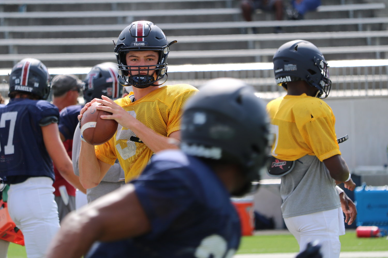 Cole Francis prepares to make a pass during Tompkins scrimmage against Cypress Ranch on Friday at Legacy Stadium.
